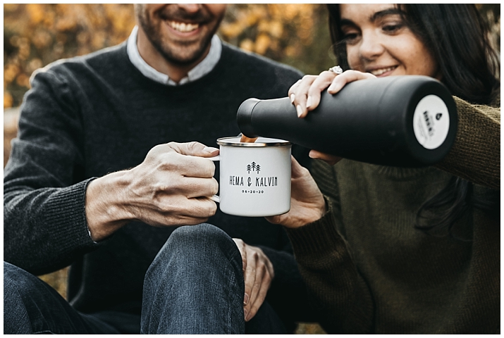 couple pouring hot chocolate at their engagement session