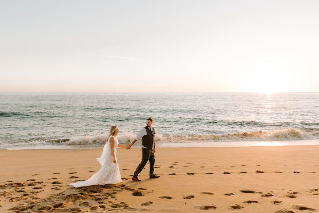 Bride and Groom portraits walking on the beach Cabo Mexico Hard Rock Hotel