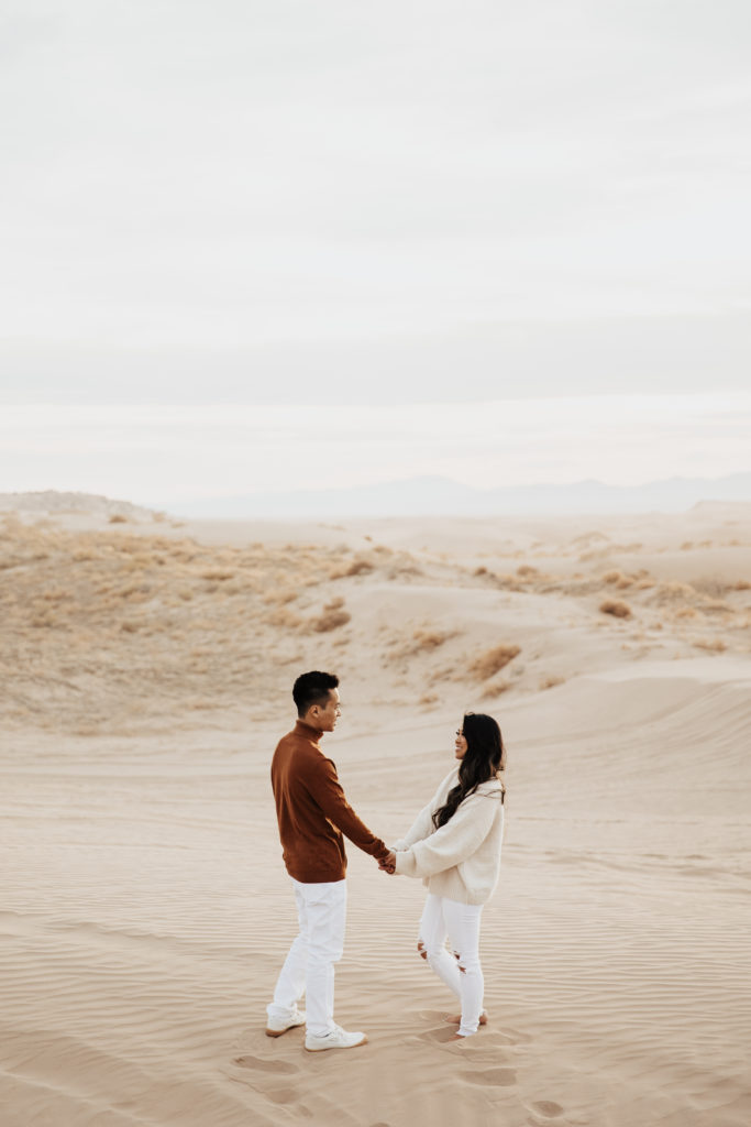 couple at little sahara sand dunes